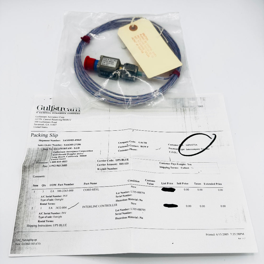 An aircraft interline controller with a part number 3432-004, accompanied by a packing slip, both displayed on a white background. The controller appears to be in plastic packaging and includes a red component and a blue cable.